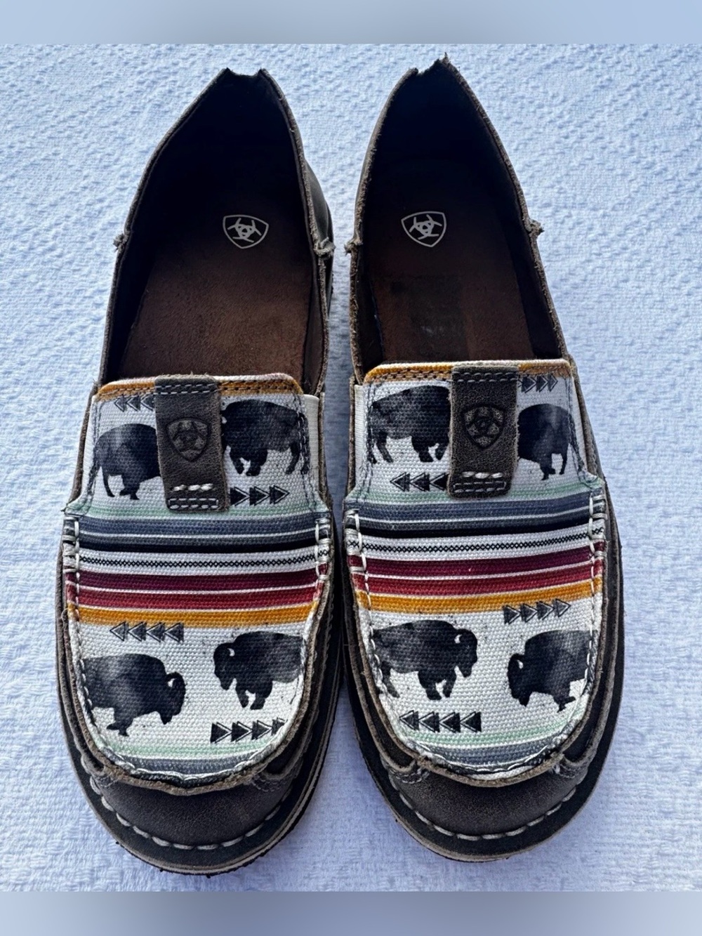 Ariat women’s Brown Canvas Moccasins with Buffalo Print and Multicolor Stripes